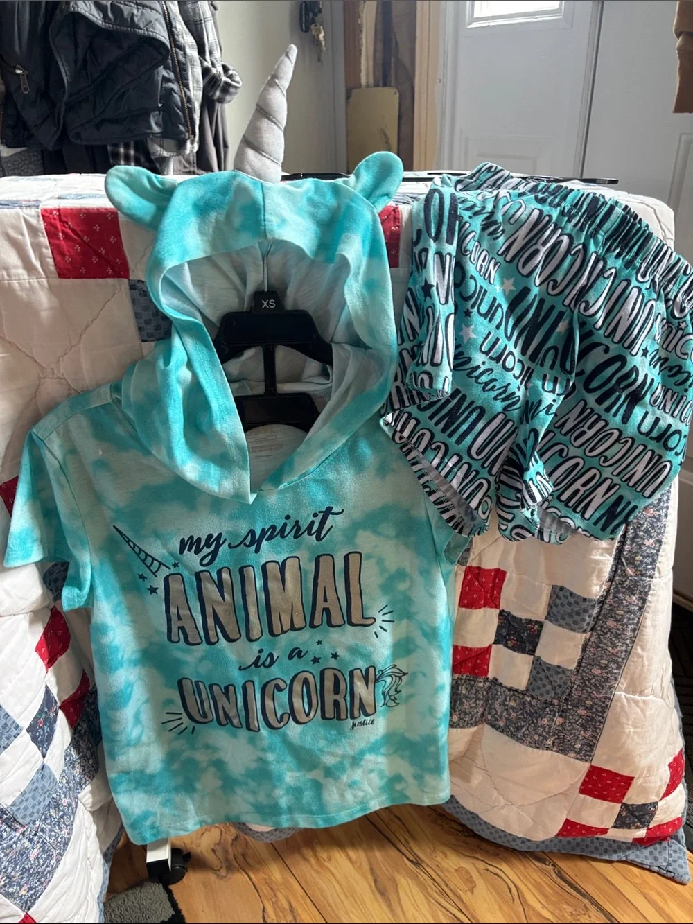 Bundle of 2 PJ’s Justice Turquoise Unicorn Hooded Pajama Set and one other set.